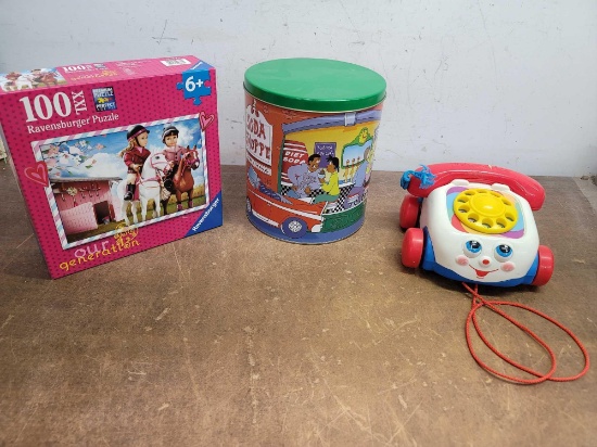 100 Piece Puzzle, Soda Shoppe Tin, and Fisher Price Chatter Telephone