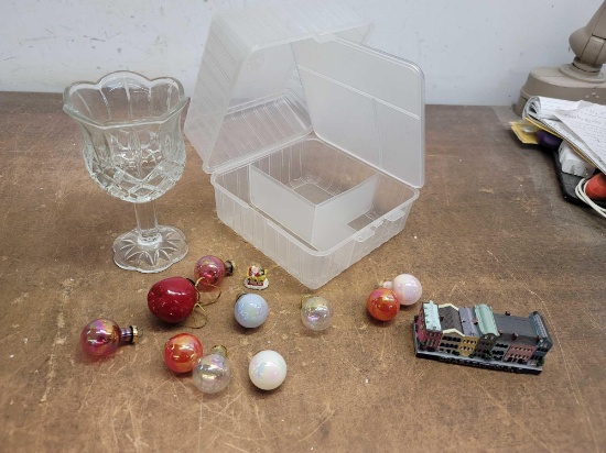 Christmas Ornaments, Figurines, A Storage Container, and 1 Stemmed Glass
