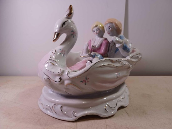 Victorian Man and Woman Riding on Swan