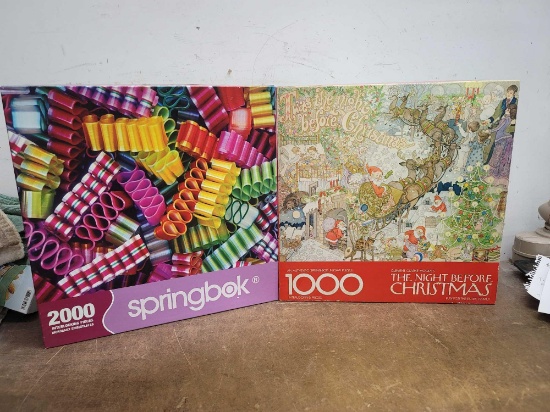 One 1000 Piece Puzzle and One 2000 Piece Puzzle