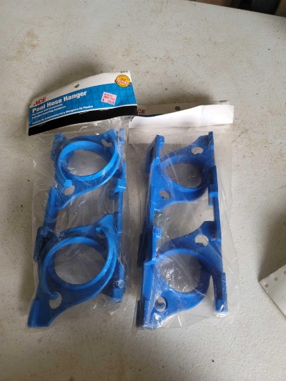 2 Pool Hose Hangers