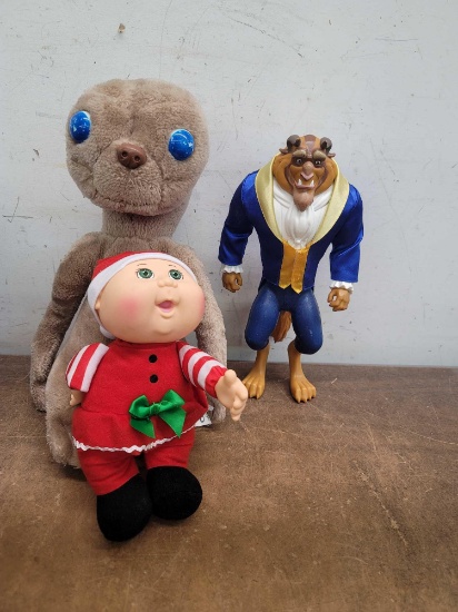 Et Stuffed Animal, Beauty and the Beast Figurine, and Cabbage Patch Doll