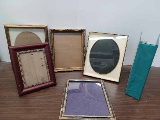 5 Picture Frames and 1 Binder