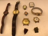 8 Watches and 2 pins