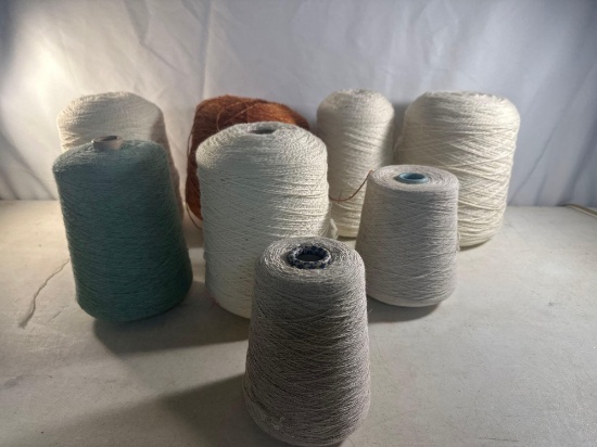 8 Spools of Yarn