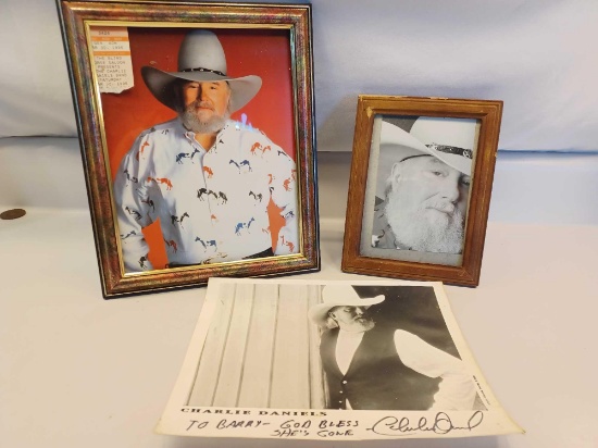2 Framed Charlie Daniels Pictures, Signed Picture, and Ticket Stub