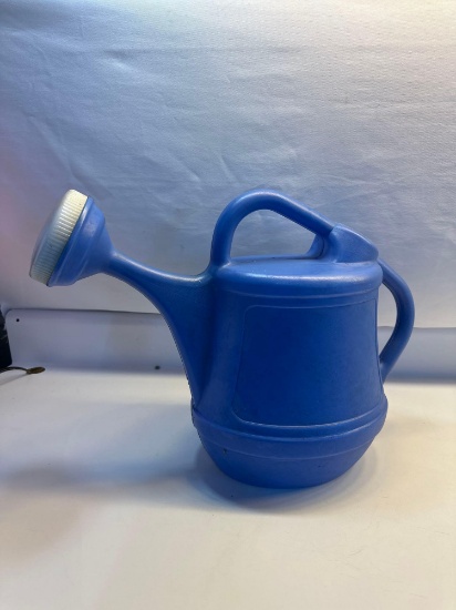 Blue Plastic Watering Can With Handle