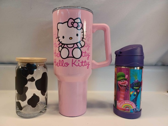 Cow Print Glass, Hello Kitty Tumbler, and Trolls World Tour Thermos