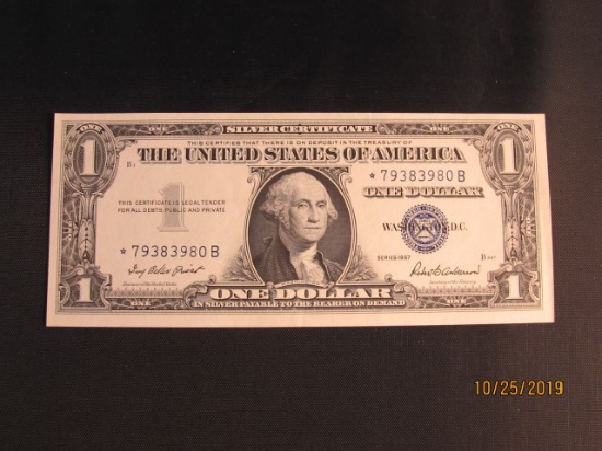 $1 SILVER CERT UNC. 1957 SERIES STAR NOTE