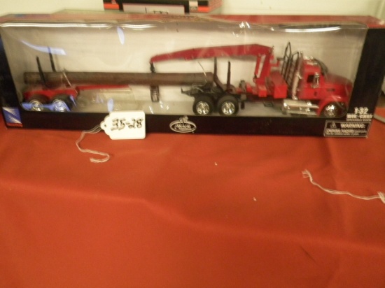 MACK LOGING SEMI 1/32 SCALE NEW RAY TOYS