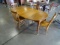 42” ROUND WOOD TABLE TO 79” OVAL 3-LEAFS EACH ONE IS 12” WIDE W/4 CHAIRS