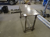 METAL CASTERED TABLE 48” X 20” NO CONTENTS