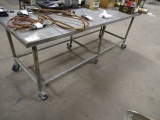 METAL CASTERED TABLE 96” X 36”