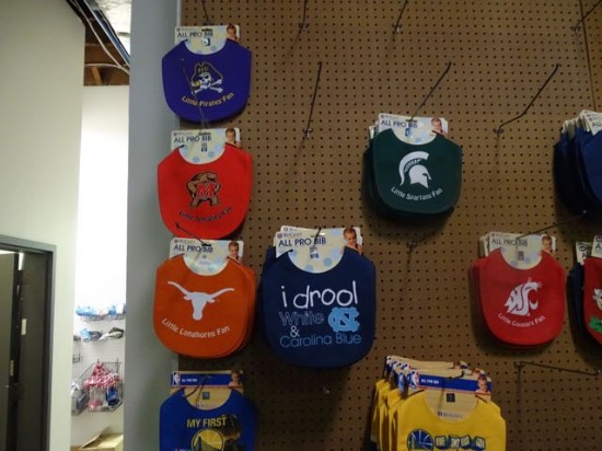 (ON RACK SOUTH & WEST WALL)  BIBS, MINI FOOTBALLS, BASKET BALLS, PENNANTS, LANYARDS,