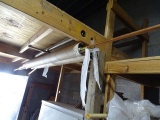 BRASS RODS UNDER SHELF
