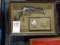 REVOLVER REPLICA WITH US MARSHALL BADGES IN DISPLAY CASE