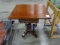 TABLE ON CASTERS
