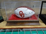 OU FOOTBALL SIGNED BY BOB STOOPS & BARRY SWITZER IN A CASE