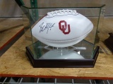 OU FOOTBALL SIGNED BY BAKER MAYFIELD IN A CASE