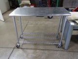 24”X50” S/S TABLE ON CASTERES