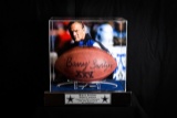 Superbowl 30 Football autographed by Barry Switzer.
