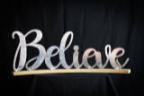 Believe Metal Curved Sign on Wood