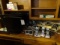 MONITORS, SPEAKERS, PANASONIC PHONES, TAPE RECORDER, HOLE PUNCH, POWER STRIP & MISC