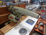 DEWALT RADIAL SAW ON WORK TABLE