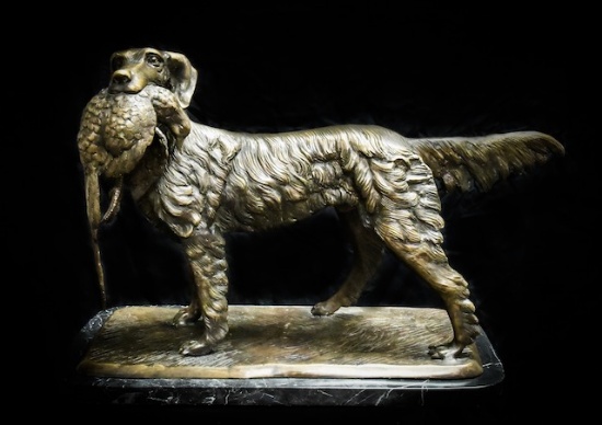 Bronze sculpture of hunting dog with pheasant