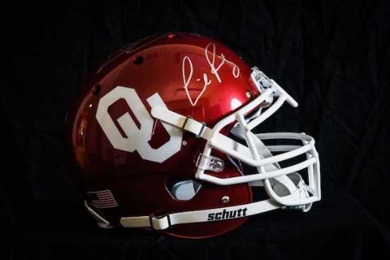 OU Helmet autographed by Switzer, Stoops, & Riley