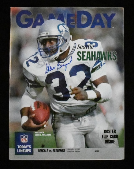 Steve Largent Autographed Program, from 1989, "100th Touchdown Catch"