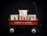 Radio Flyer wagon with wooden ABC blocks