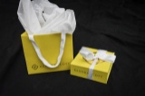 Kendra Scott silver bracelet and matching stud earrings
