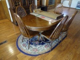 48” ROUND OAK DINING ROOM TABLE W/2-18” LEAVES & 6 WINDSOR BACK CHAIRS