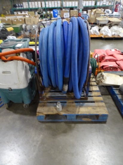 CARPET VACUUM HOSE REEL W/ABOUT 300' OF 2" SUCTION HOSE & ABOUT 75' OF LOW PRESSURE WATER LINE