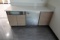 COUNTER W/REFRIGERATOR & TRASH RECEPTACLE