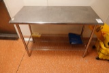 S/S TABLE W/SHELF 49.5” X 24”