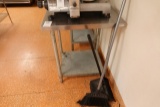 S/S TABLE W/SHELF 24” X 30”