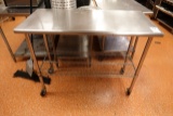 S/S TABLE W/SHELF & CASTERS 50” X 24”