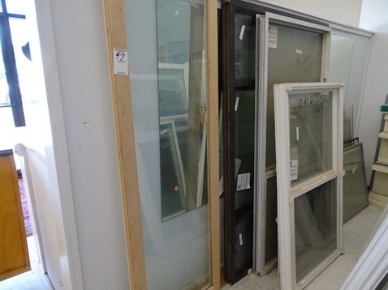 APPX (11) COMPLETE WINDOWS & MISC. IN FRONT OF SHOWROOM (X1)