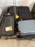 PALLET W/ SUITCASES, SKIBOOTS AND MISC.