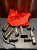 TAXABLE BAG OF HITCHES AND WHEEL CHOCKS