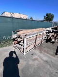 Metal Rack w/Stack of Wood