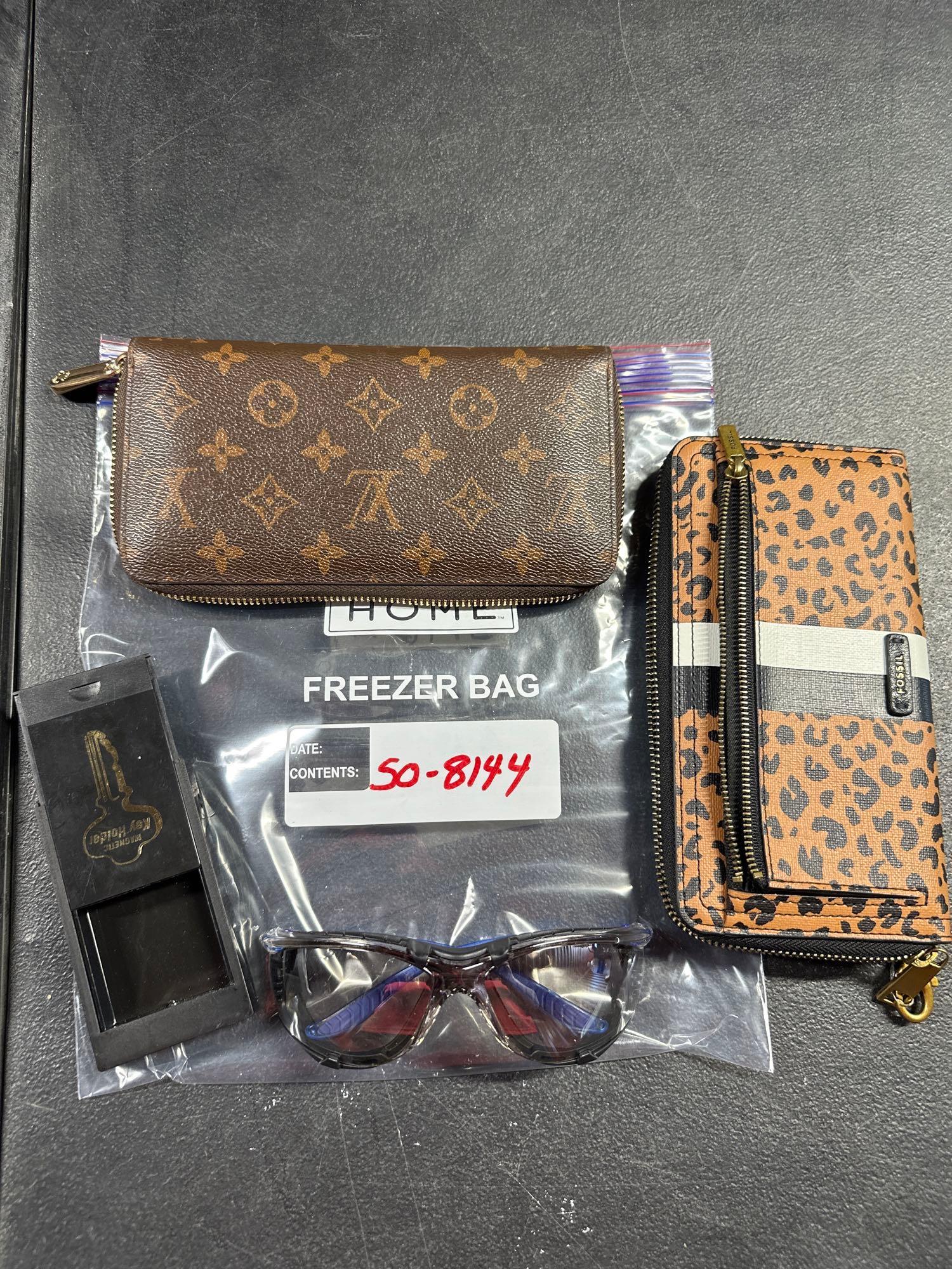 Taxable Wallets and Glasses Proxibid