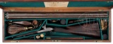 PERCUSSION DOUBLE SHOTGUN BY THOMAS K. BAKER WITH CASE.
