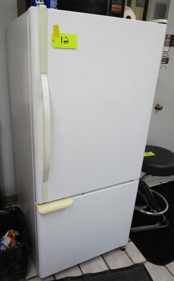 Refrigerator with bottom freezer (could use a cleaning)