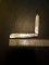 Single blade mother of pearl with markings on