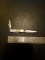 Unknown single blade with tweezers