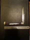 Remington R1253L , 5.25 inch. brown bone bullit
