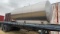 40 FT FLAT TRAILER WITH 3600 GAL. STAINLESS STEEL TANK AND 3 INCH TRANSFER